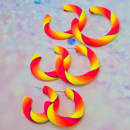 Malibu Glow Twisted Hoops