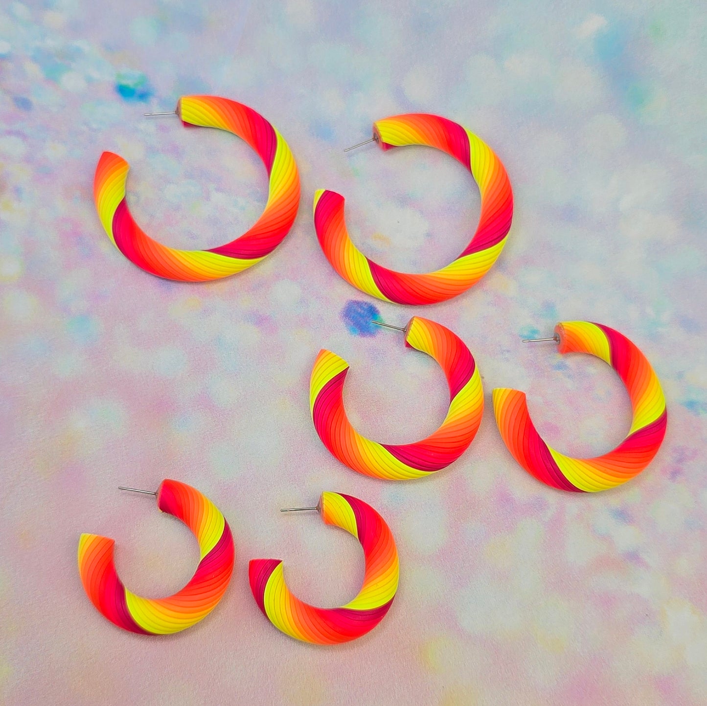 Malibu Glow Twisted Hoops